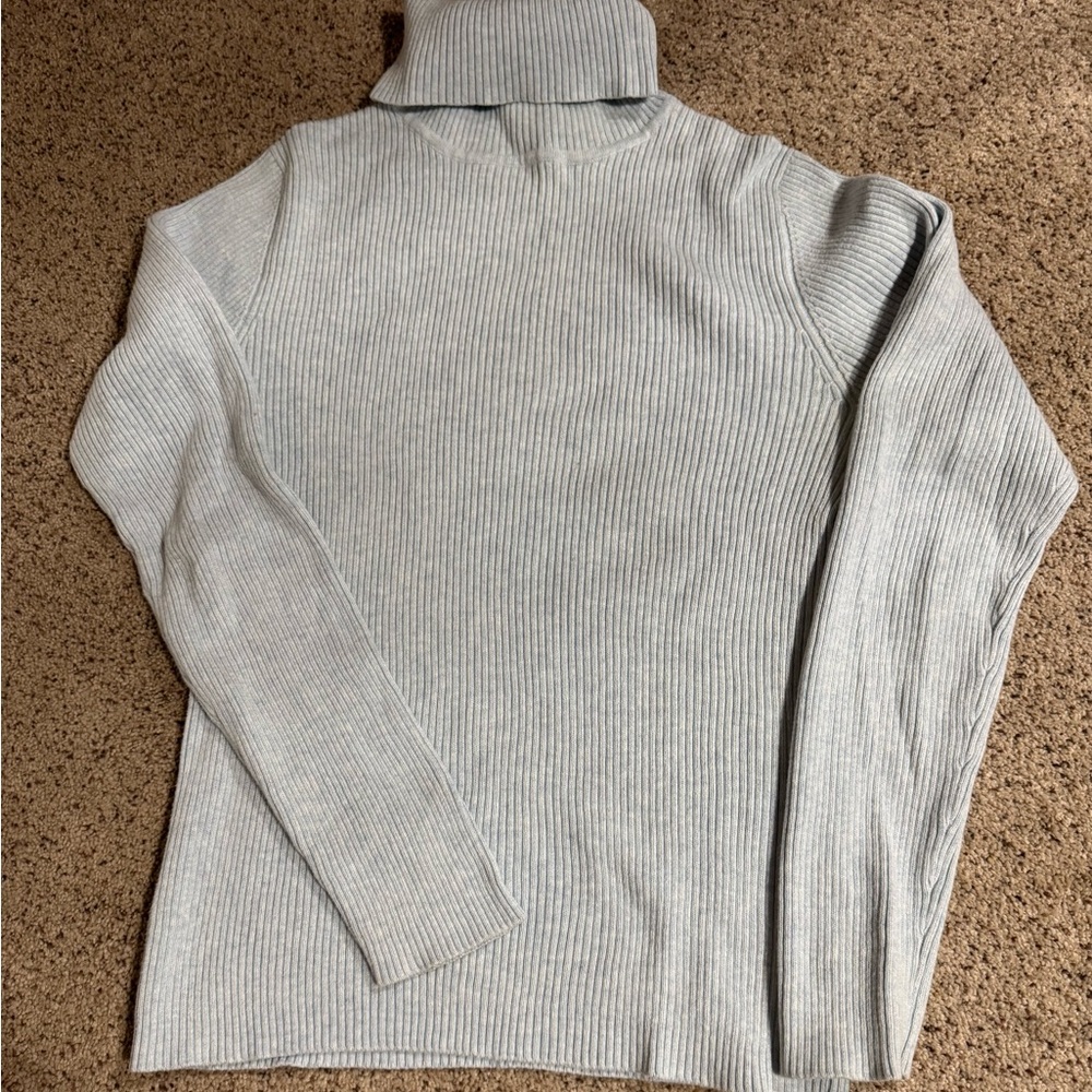 Women’s Ribbed Turtleneck Sweater in light blue.